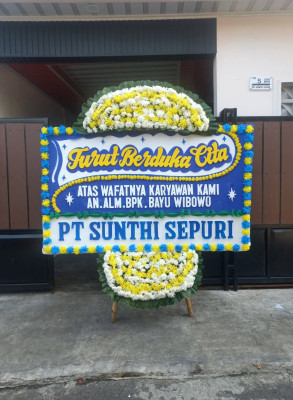 Papan Bunga Duka di Poigar