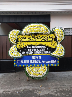 Papan Bunga Duka di Poigar